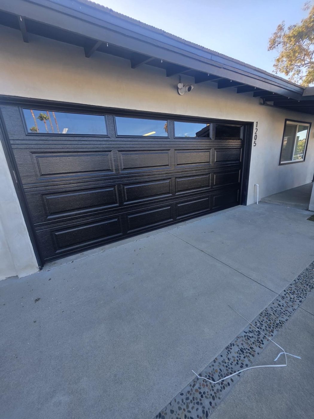Dark wood-grain finish door installation, Orange County