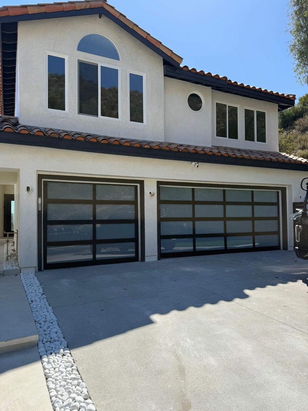 Full-view modern glass garage doors, custom install